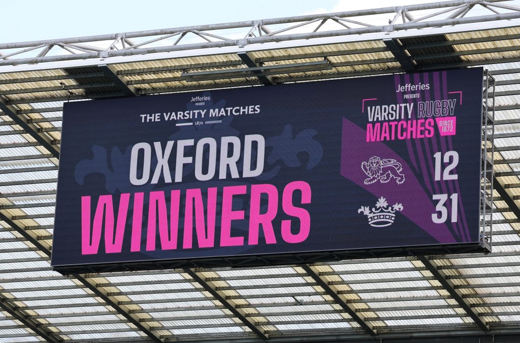 Image of the scoreboard at the Varsity Matches showing Oxford winning 31 to 12